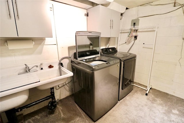 1219 Minnesota Ave, Natrona Hts/Harrison Twp, PA 15065 - laundry area with concrete block wall, washer and dryer, and cabinet space