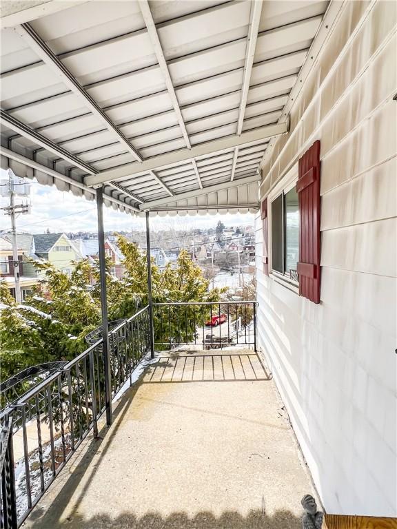 view of patio with a balcony