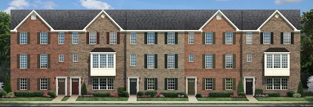 view of front facade featuring brick siding