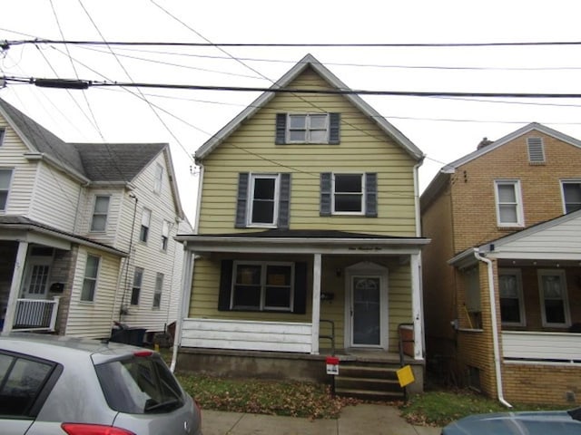 view of front of home featuring covered porch