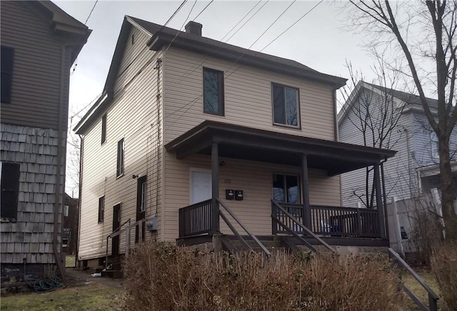 view of front of home featuring covered porch