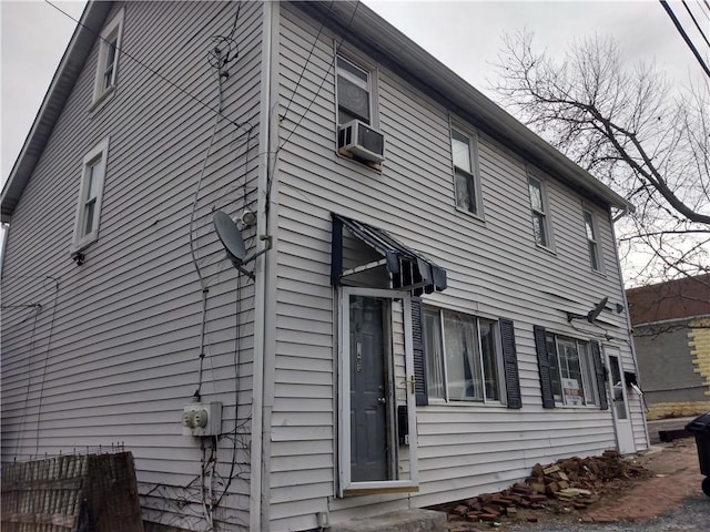 view of home's exterior featuring cooling unit