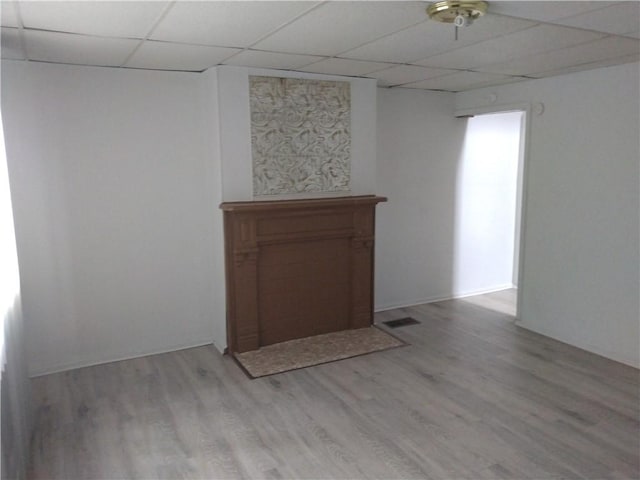 1405-1407 W W, Homestead, PA 15120 - empty room featuring a drop ceiling and light wood-style floors