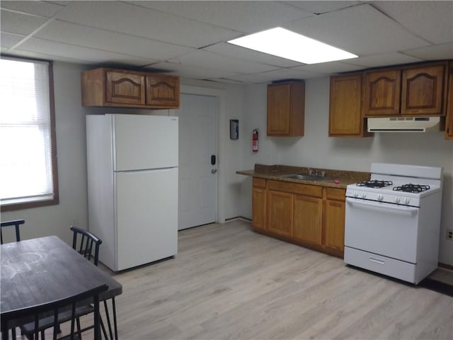1405-1407 W W, Homestead, PA 15120 - kitchen with white appliances, range hood, a sink, a drop ceiling, and brown cabinetry