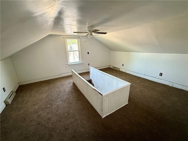 1405-1407 W W, Homestead, PA 15120 - bonus room featuring dark colored carpet, a ceiling fan, lofted ceiling, and a baseboard radiator
