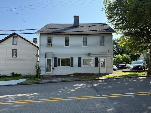 1405-1407 W W, Homestead, PA 15120 - view of front facade with a chimney and cooling unit
