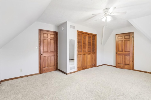 additional living space with ceiling fan, light carpet, and lofted ceiling