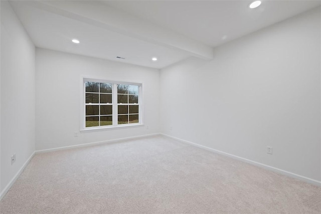 unfurnished room with baseboards, light colored carpet, beam ceiling, and recessed lighting