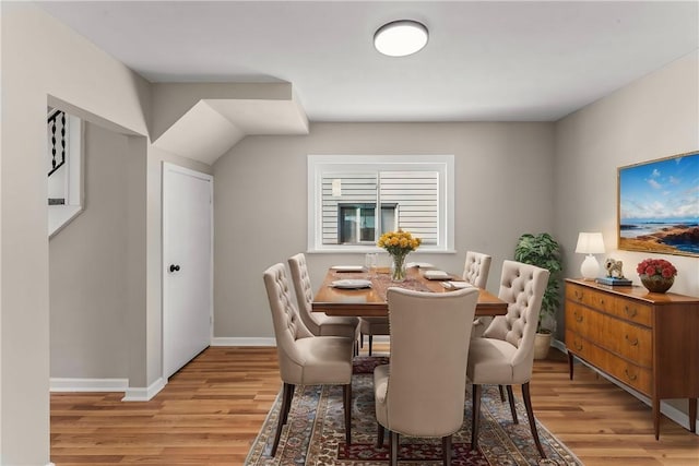 dining area with light wood-type flooring