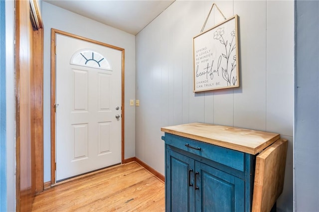 foyer entrance with light wood-type flooring