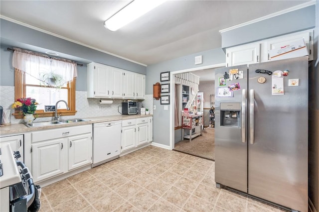 kitchen with white cabinetry, dishwasher, stainless steel refrigerator with ice dispenser, and sink