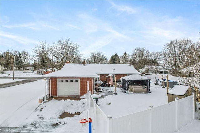 single story home with a garage