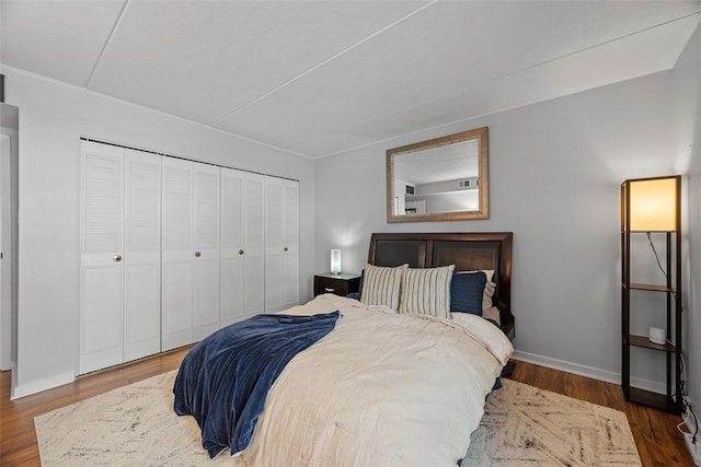 bedroom featuring a closet and hardwood / wood-style floors