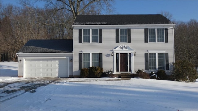 colonial-style house with an attached garage