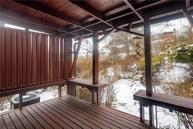 view of snow covered deck