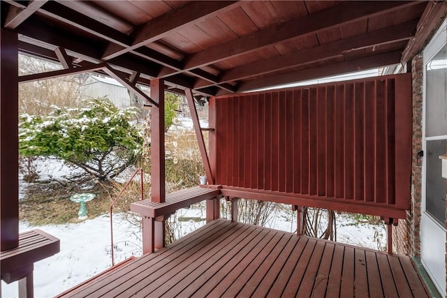 view of snow covered deck