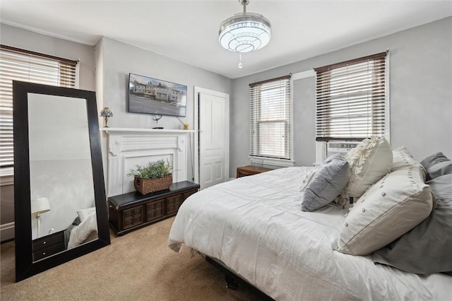 carpeted bedroom featuring a closet and cooling unit