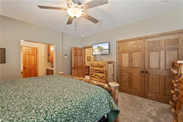 carpeted bedroom featuring ceiling fan