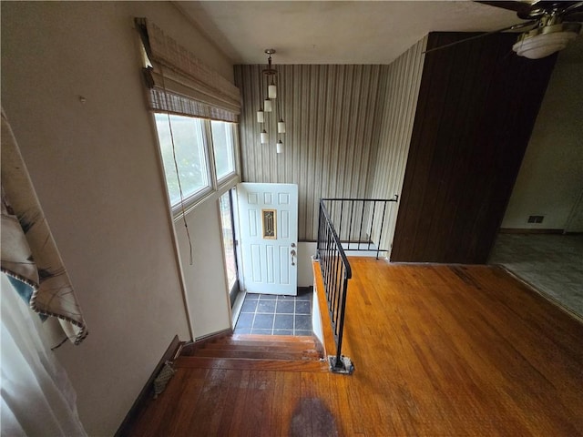 foyer with dark wood-style flooring