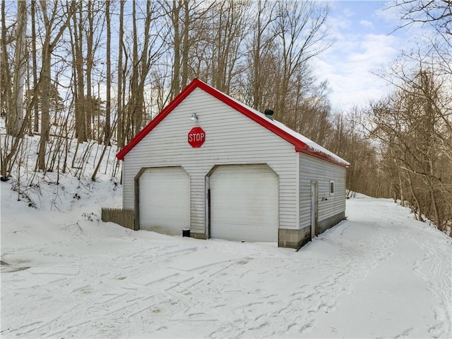 view of snow covered garage