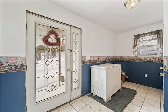 interior space with light tile patterned floors