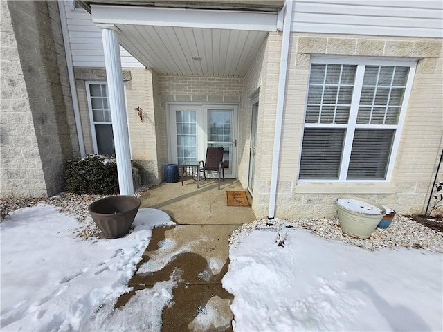 view of snow covered patio