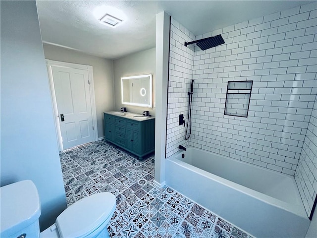 bathroom with double vanity, visible vents, a sink, tile patterned flooring, and bathing tub / shower combination