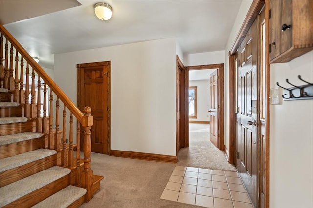 169 Clearview Rd, Raccoon Twp, PA 15001 - foyer entrance with baseboards, light carpet, and stairs