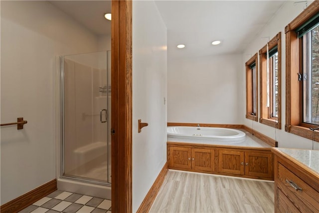 169 Clearview Rd, Raccoon Twp, PA 15001 - bathroom with a shower stall, a garden tub, baseboards, and recessed lighting