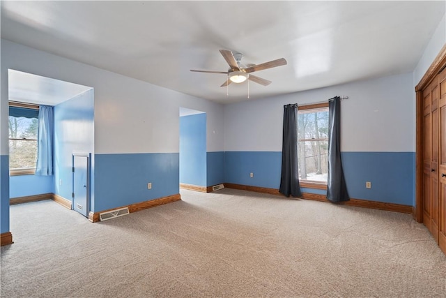 169 Clearview Rd, Raccoon Twp, PA 15001 - unfurnished room featuring light carpet, baseboards, and a ceiling fan