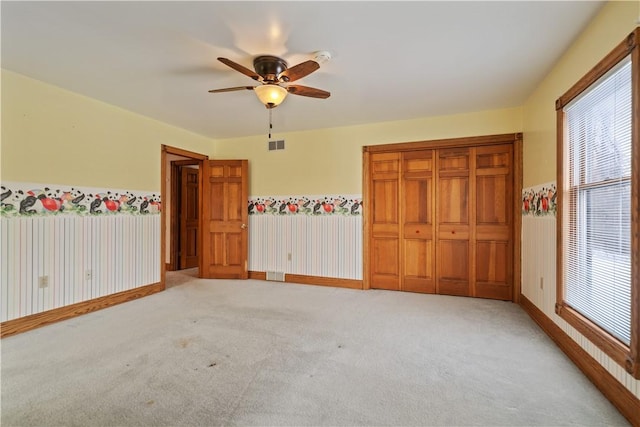 169 Clearview Rd, Raccoon Twp, PA 15001 - unfurnished bedroom with visible vents, baseboards, ceiling fan, and light carpet