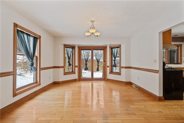 169 Clearview Rd, Raccoon Twp, PA 15001 - foyer entrance featuring visible vents, baseboards, a notable chandelier, and light wood-style floors