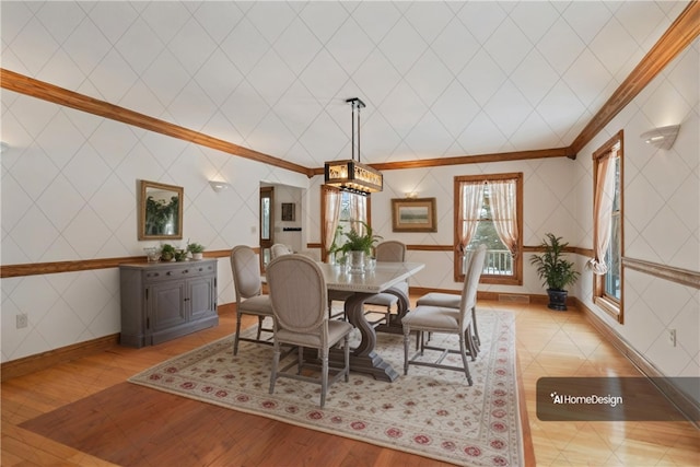 169 Clearview Rd, Raccoon Twp, PA 15001 - dining room featuring crown molding, baseboards, and light wood finished floors