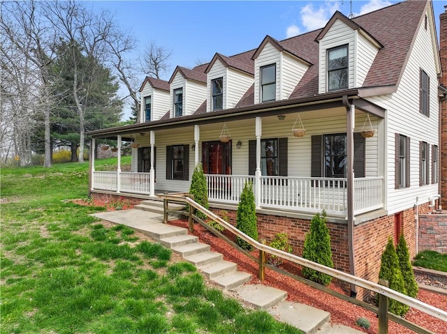 169 Clearview Rd, Raccoon Twp, PA 15001 - cape cod home featuring a front lawn, a shingled roof, and covered porch