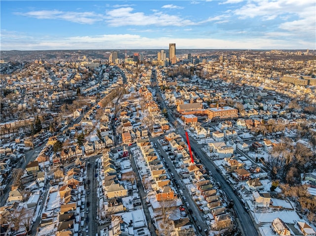 drone / aerial view featuring a city view