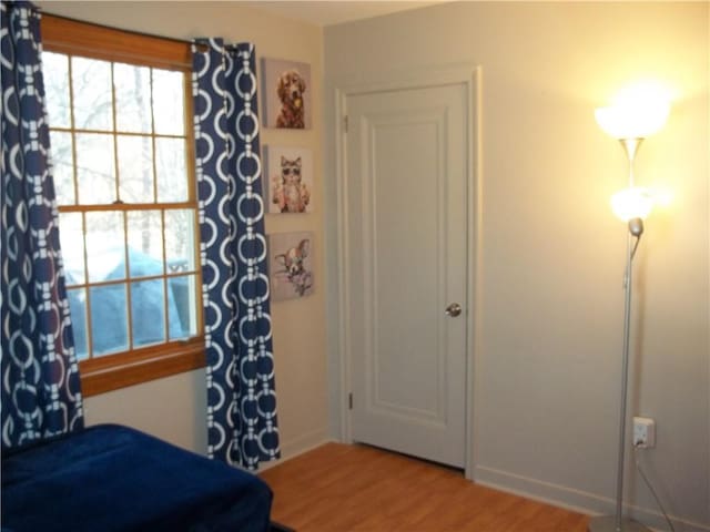 bedroom featuring wood finished floors