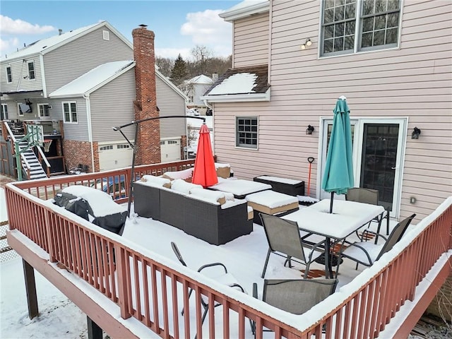 view of snow covered deck