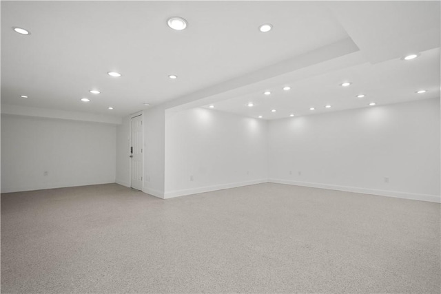 basement featuring recessed lighting and baseboards