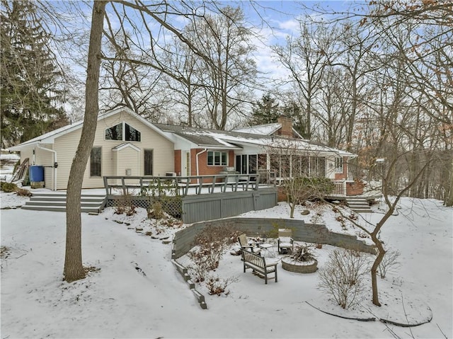 view of front of home featuring a chimney