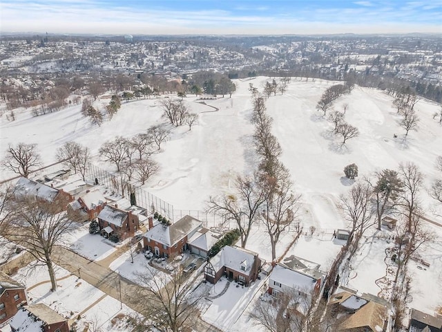 snowy aerial view featuring a residential view