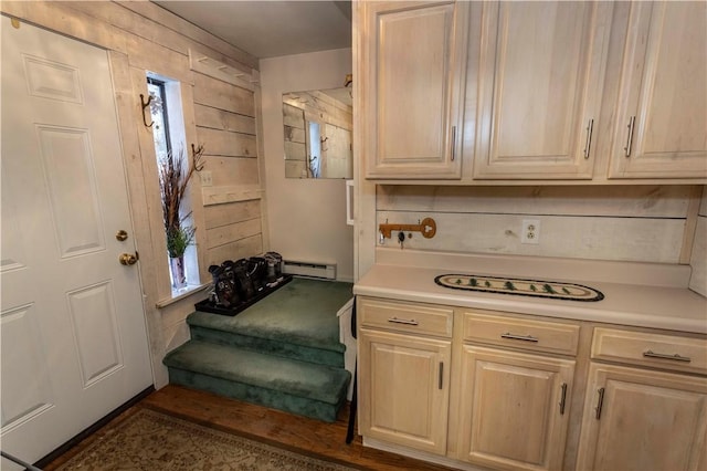 kitchen featuring a baseboard radiator and light countertops