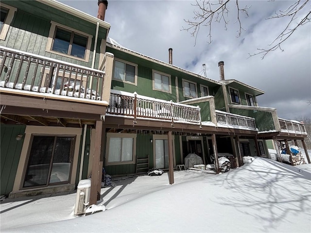 view of snow covered property