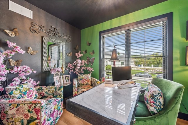 home office featuring plenty of natural light and visible vents