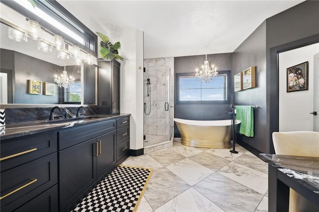 bathroom featuring a notable chandelier, vanity, marble finish floor, a soaking tub, and a shower stall