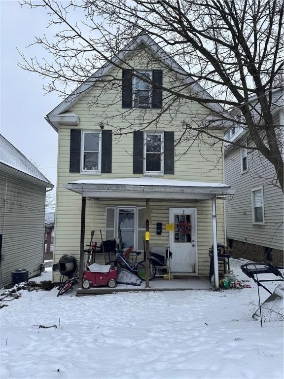 view of front of property featuring covered porch