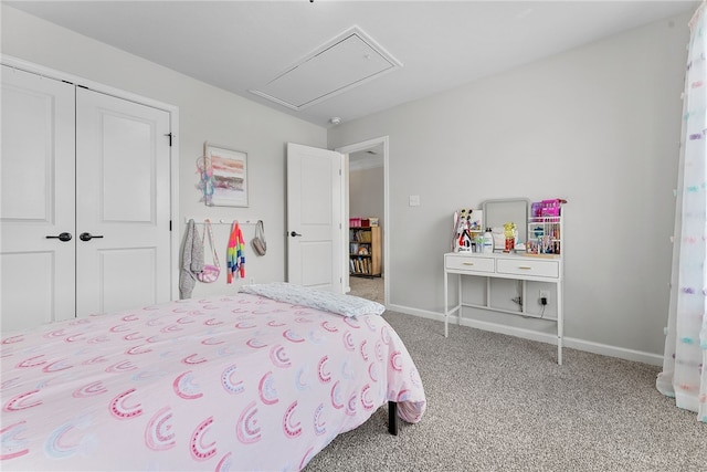 bedroom featuring carpet, a closet, and baseboards