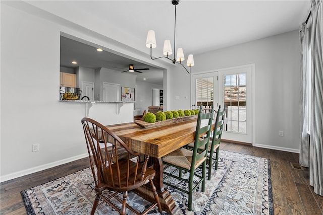 dining space with recessed lighting, visible vents, baseboards, dark wood-style flooring, and ceiling fan with notable chandelier