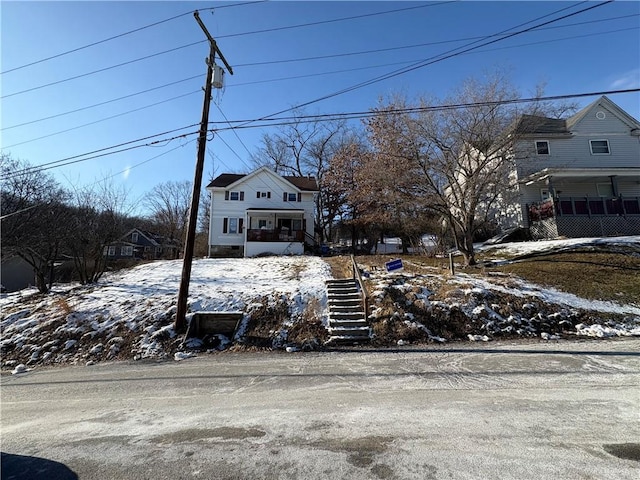 view of front of house with stairway