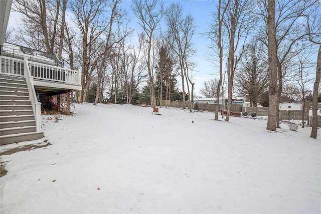 snowy yard with stairway