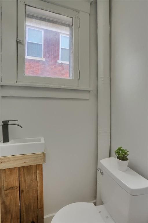 bathroom with a sink and toilet